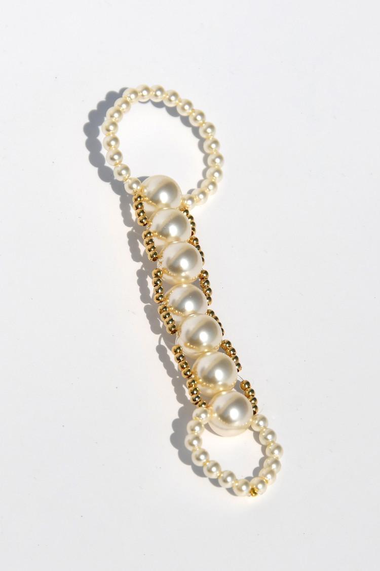 Gold pearl long ring