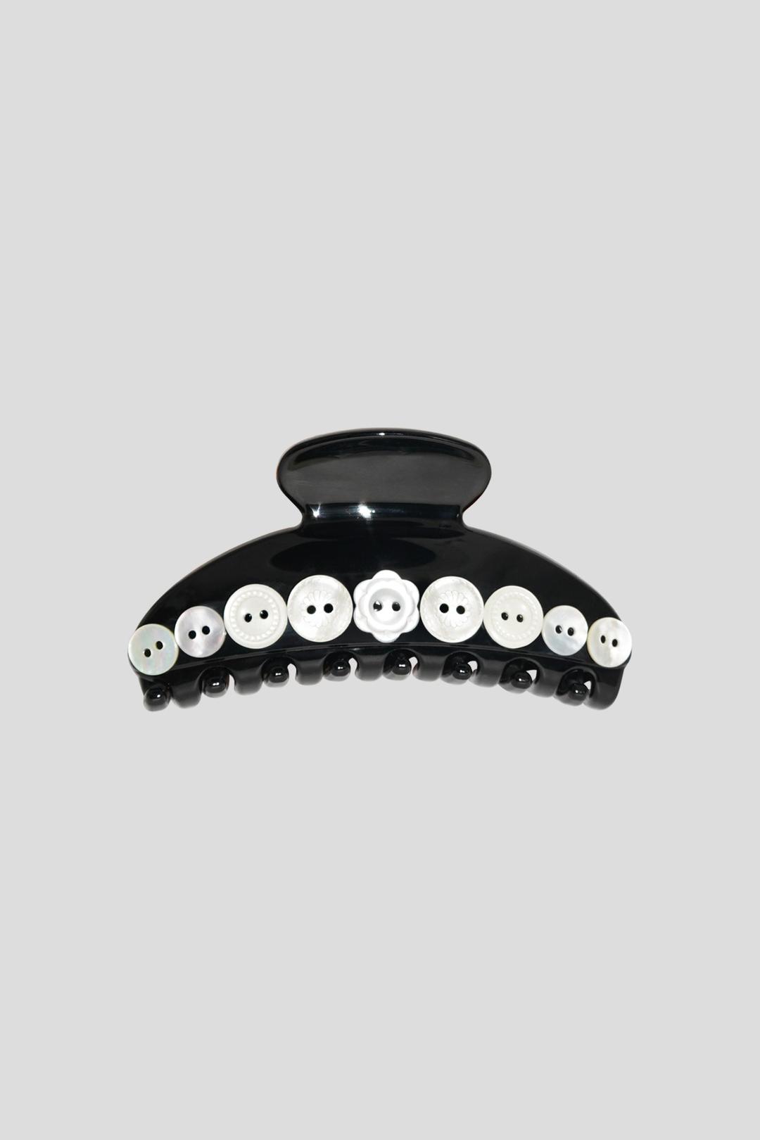 white button hair clip