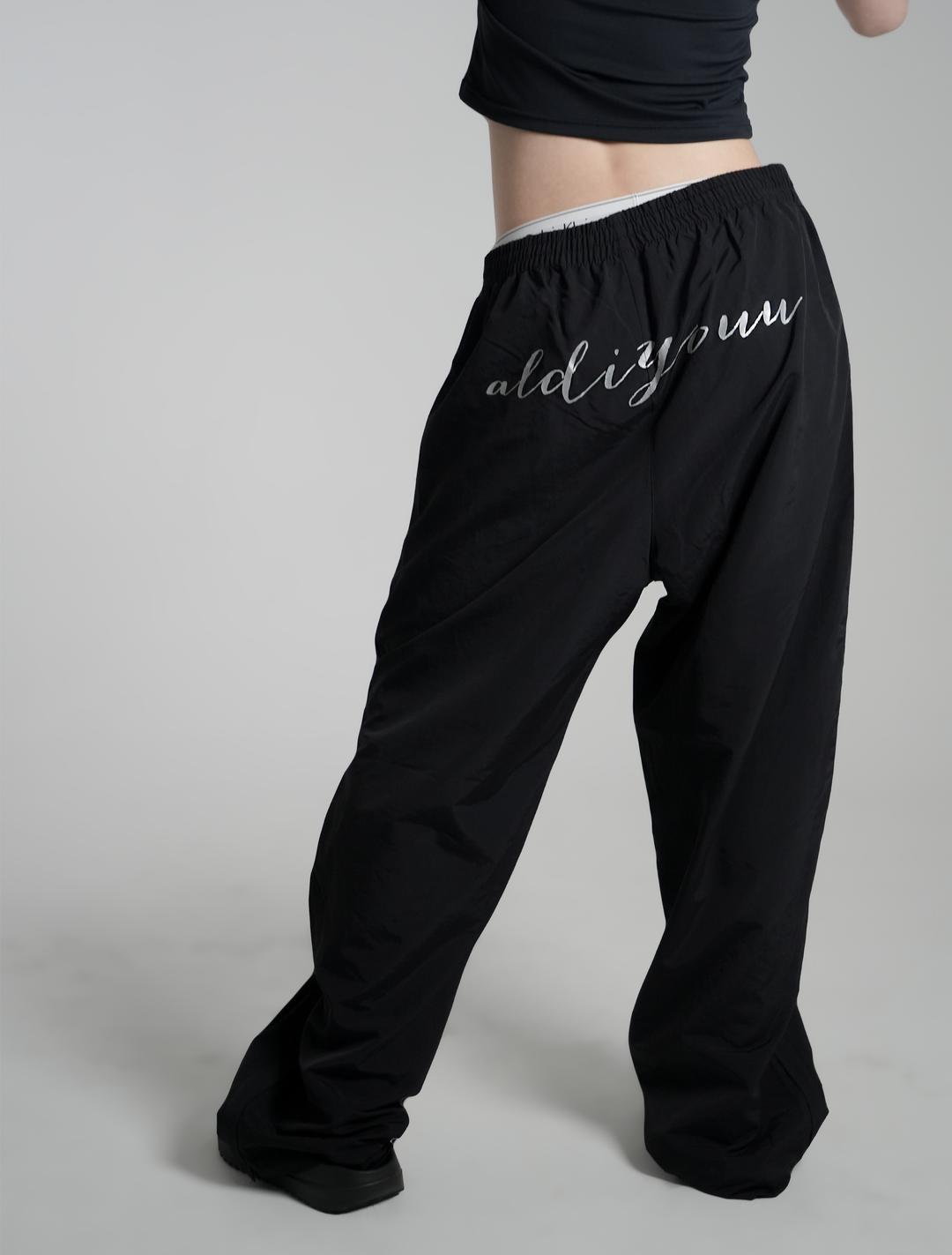 Nylon reflective pants - black