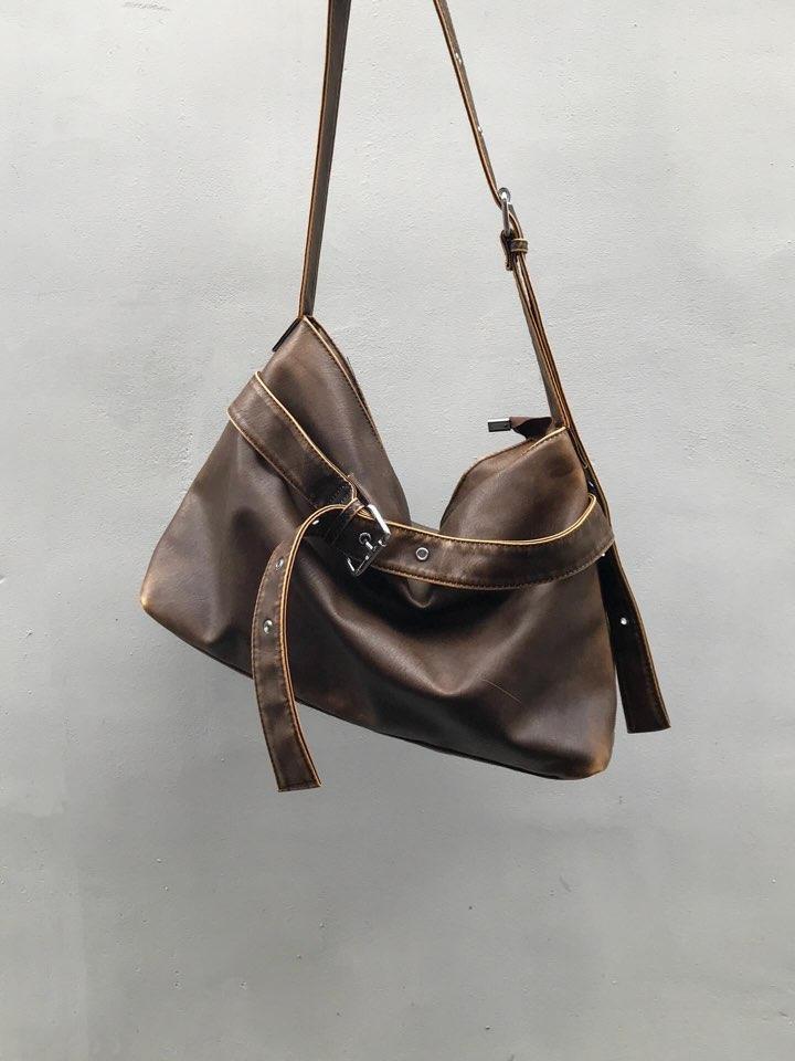 Vintage brown belted leather bag