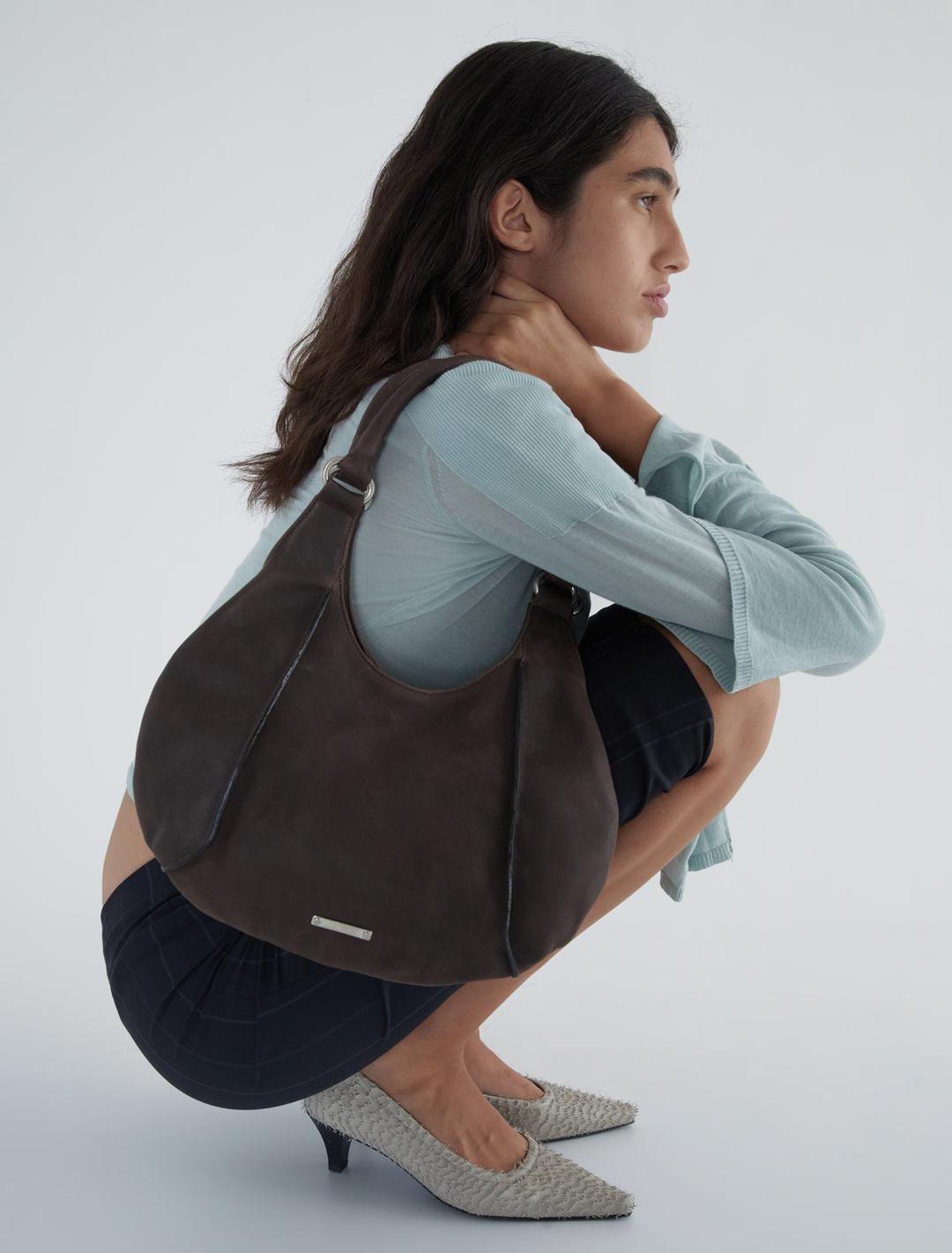 MORGAN-Brown rounded sack-style shoulder bag with magnet closure