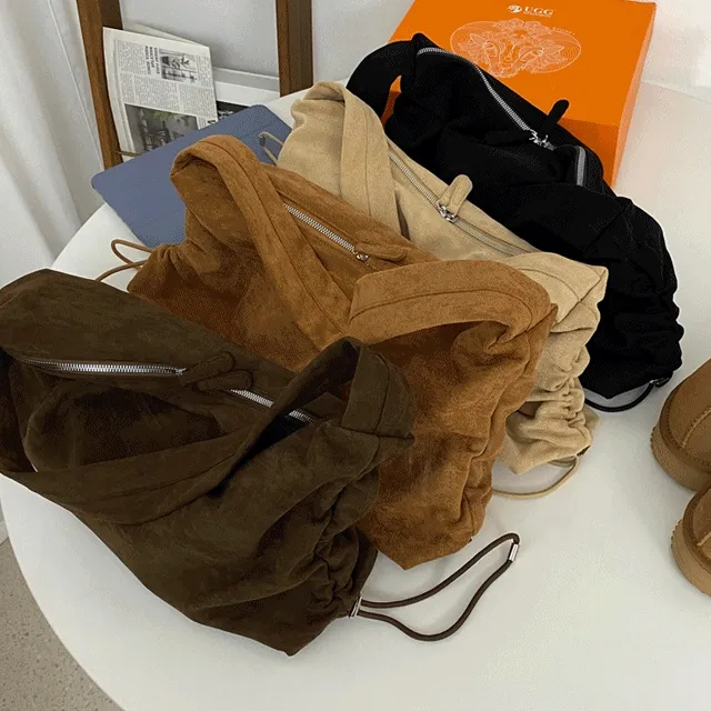 [유니크] 무지 스웨이드 양옆 스트링 셔링 숄더백