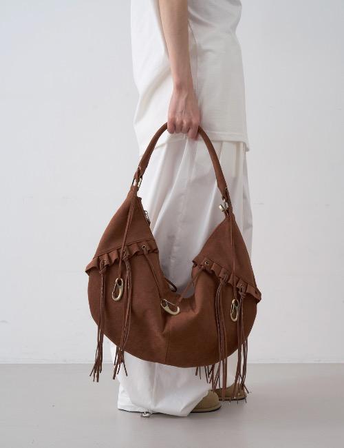 suede tassel clip bag