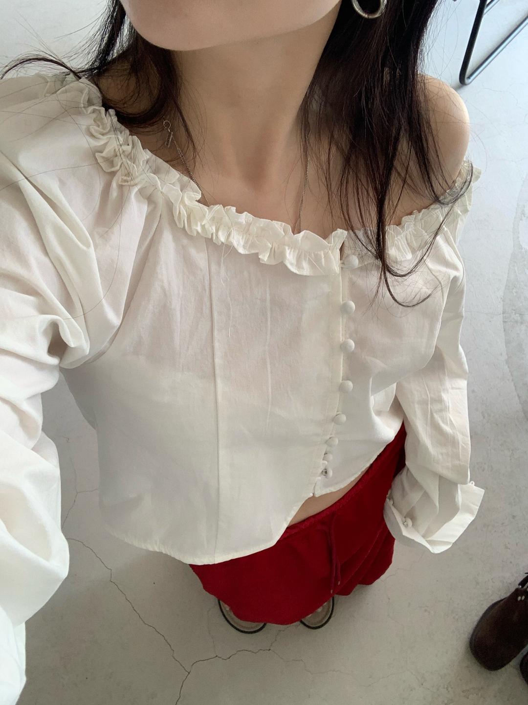 cream blouse