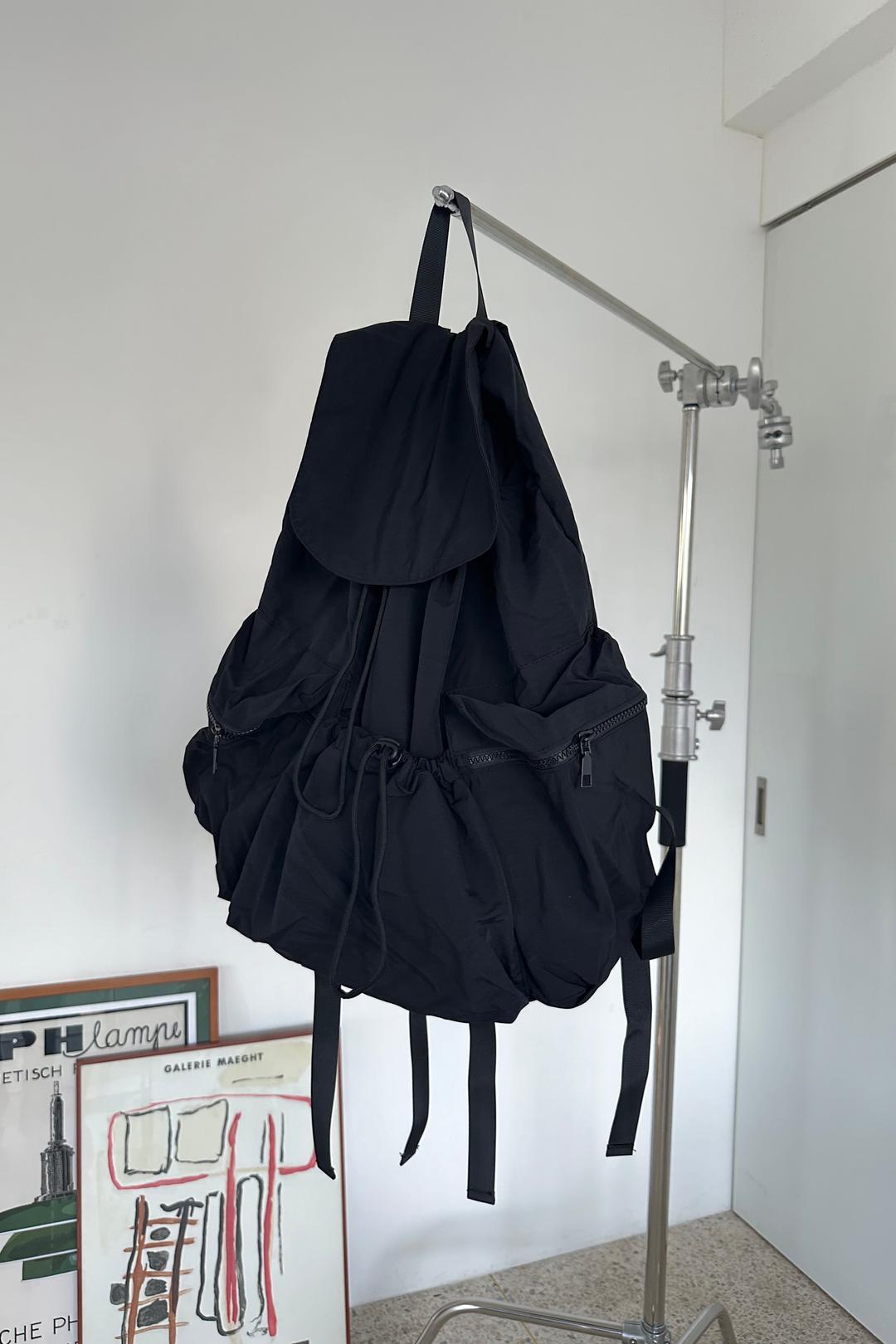 Nylon flip light backpack