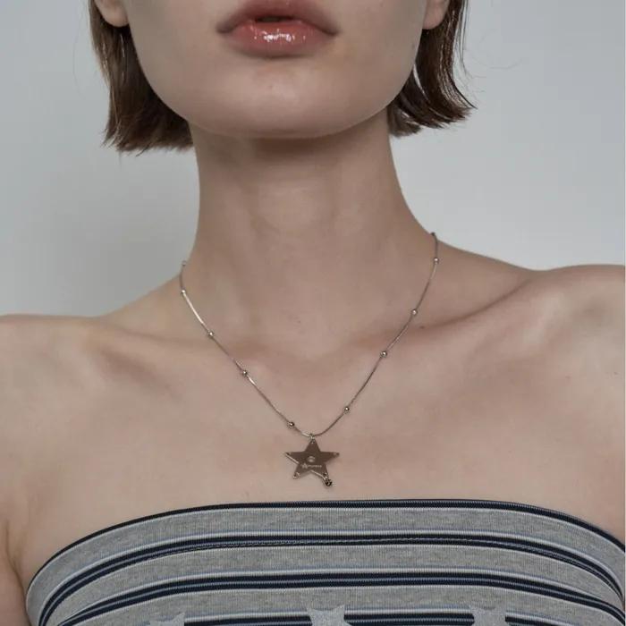 PIERCING STAR NECKLACE / SILVER
