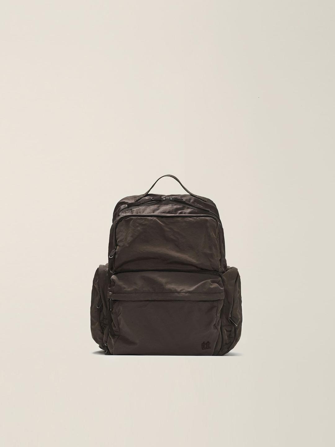 TRANSFORMABLE UTILITY POCKET BACKPACK (SMALL) BROWN
