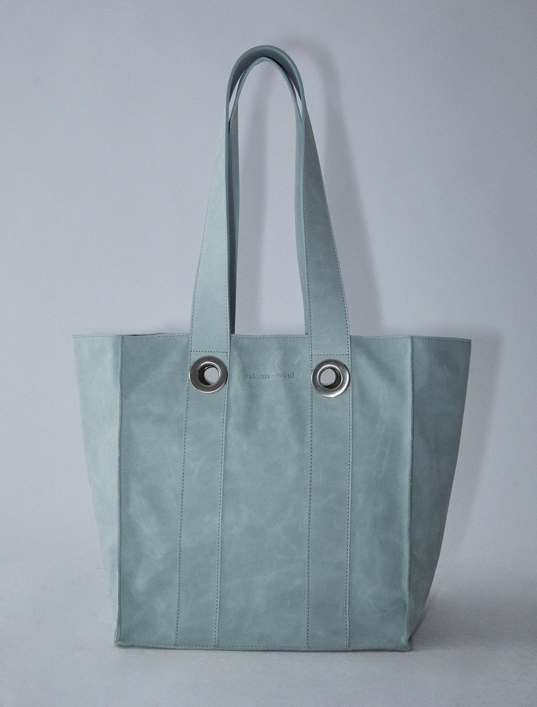 MILAGROS-Aquamarine square-shaped bucket bag with two eyelets details at the top