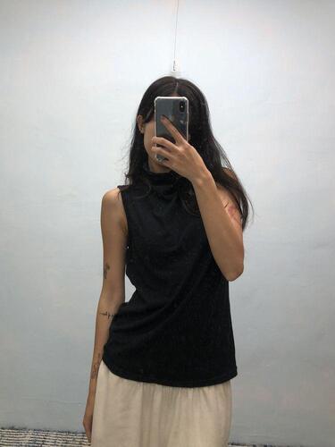 Black wide turtle neck sleeveless
