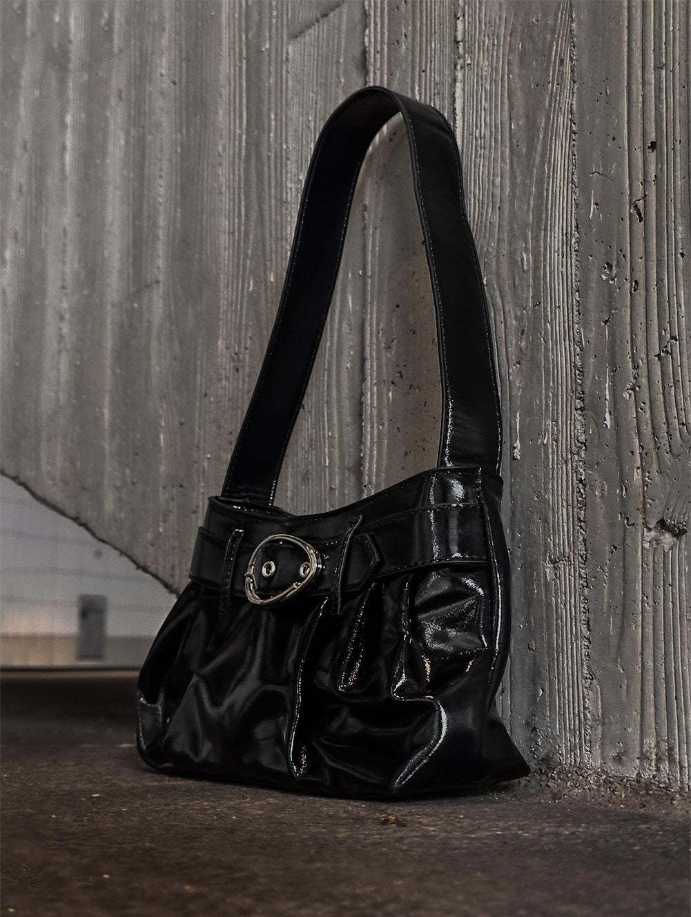 Oval buckle shoulder bag