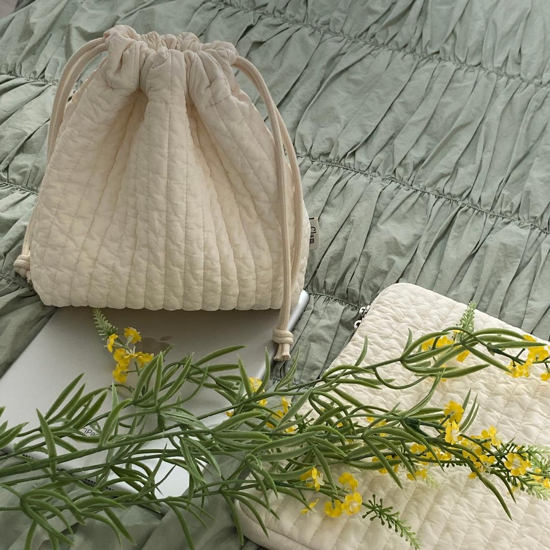 Clam string pouch _ Soft cream