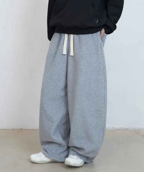 스월 패치 플리스 팬츠 (멜란지)