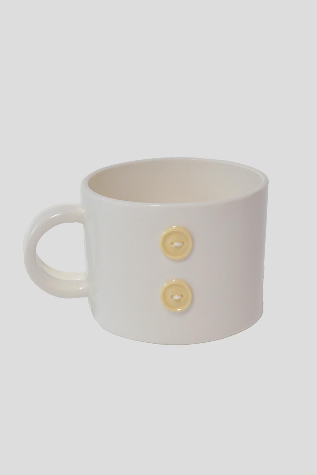 Yellow button cup