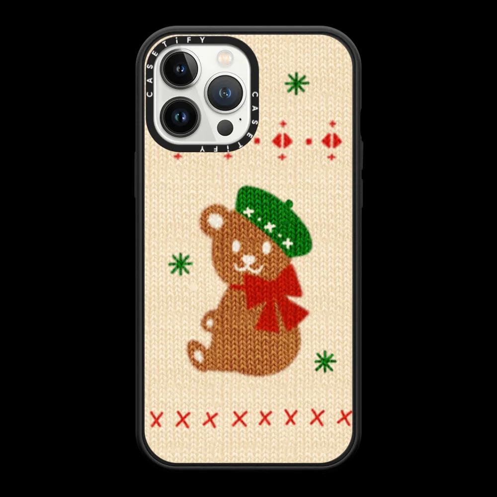 Cute Christmas winter teddy bear in cozy and warm knit texture