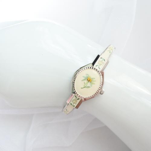 2000s ANDRE MOUCHE hidden bangle watch