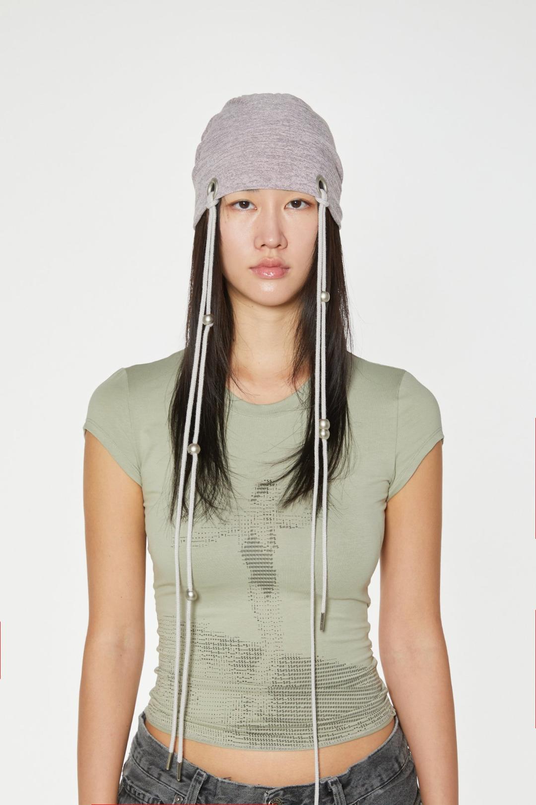 .eyelet string beanie — .nibgnus