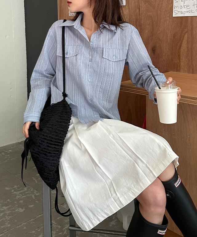 데일리쥬 리던 코튼 플리츠 미디 스커트