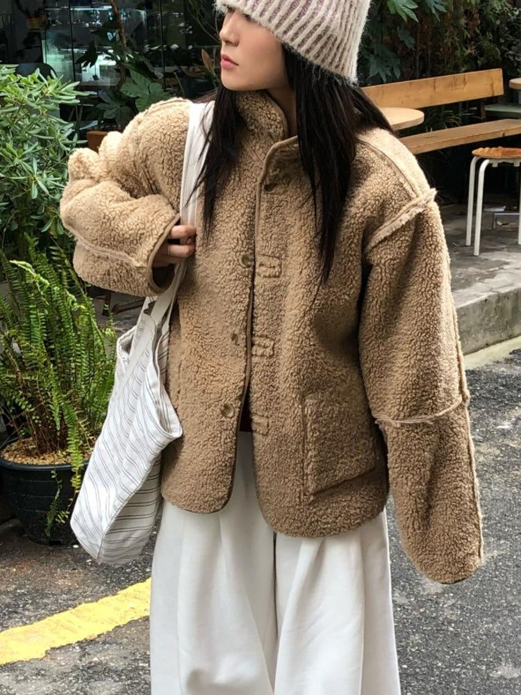 무브 리버시블 양털 무스탕