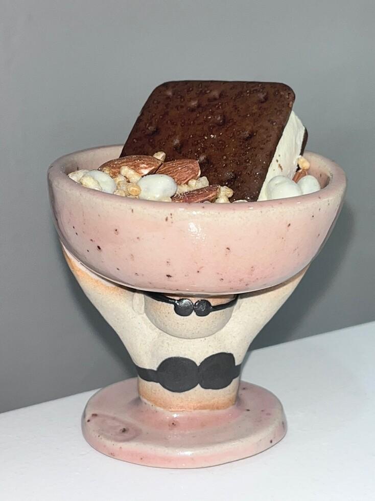 holding a yogurtbowl