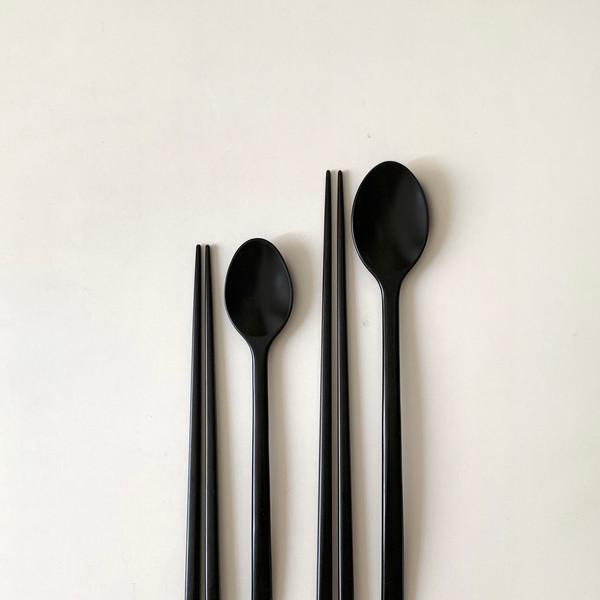 black wooden cutlery set