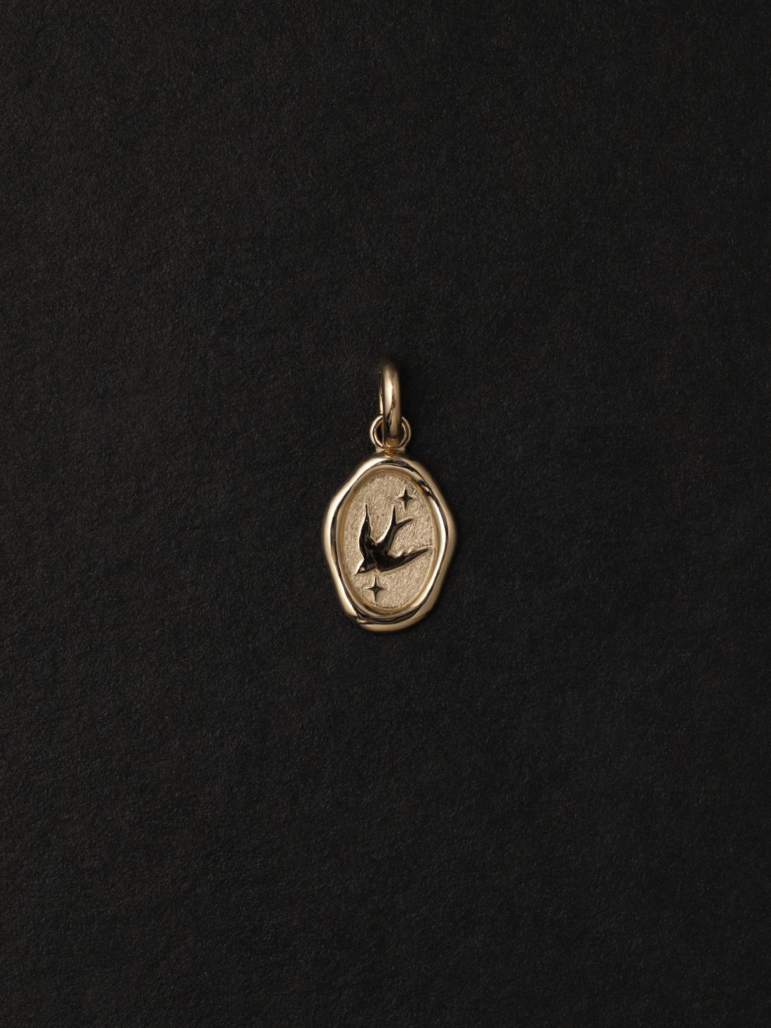 oval wax seal large pendant: swallow.