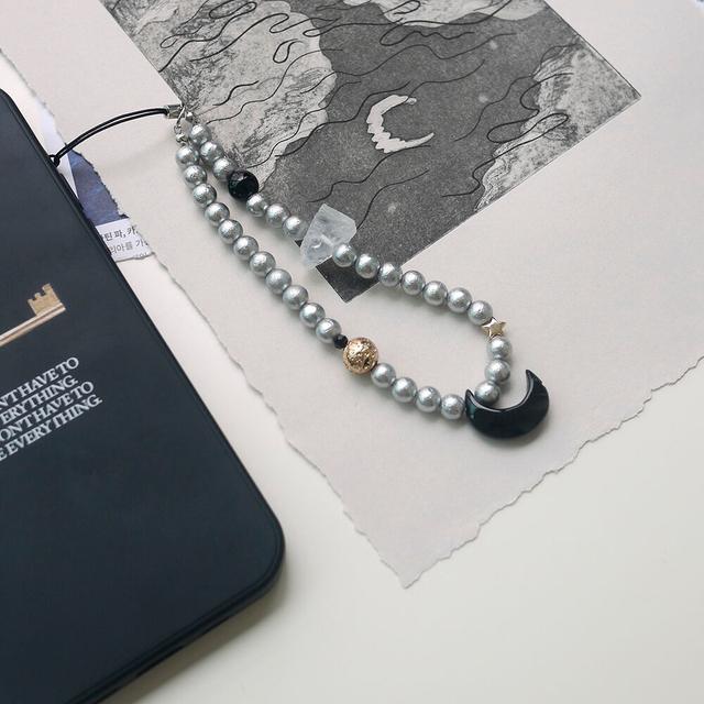 black moon phone strap