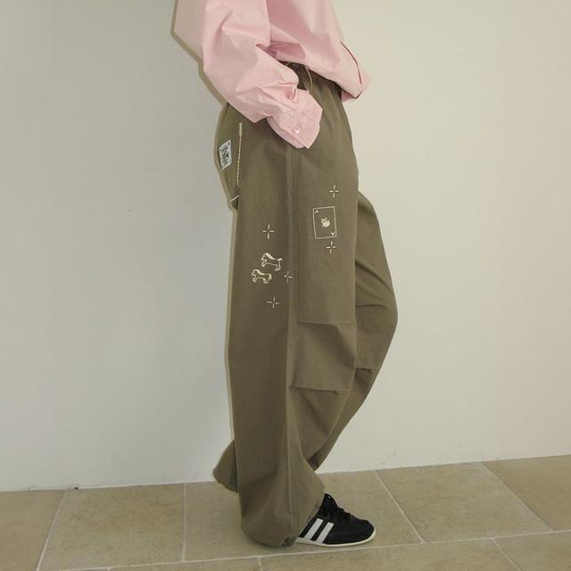 DRAWING STITCH PARACHUTE PANTS KHAKI