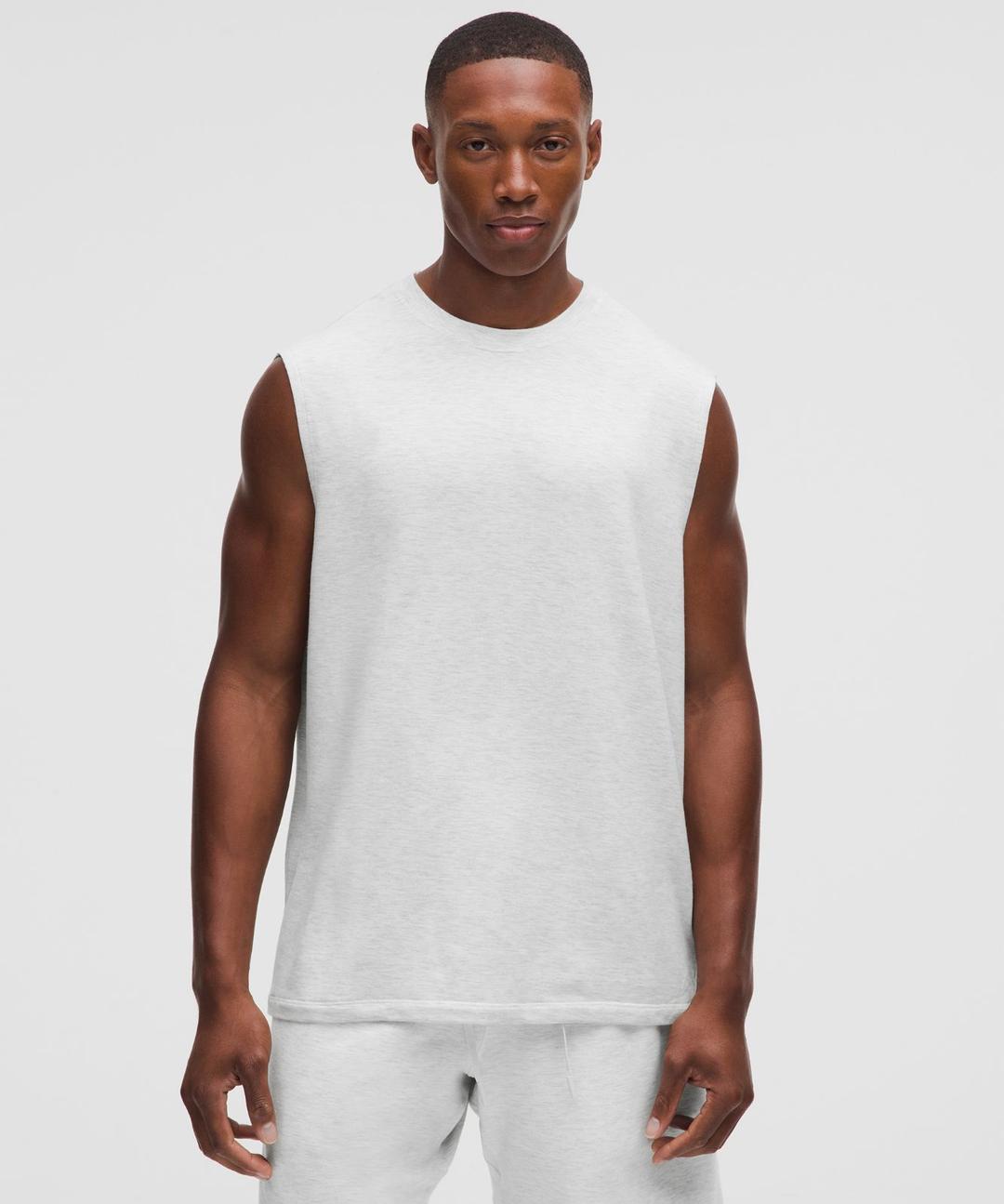 비캄 릴랙스 핏 슬리브리스 셔츠