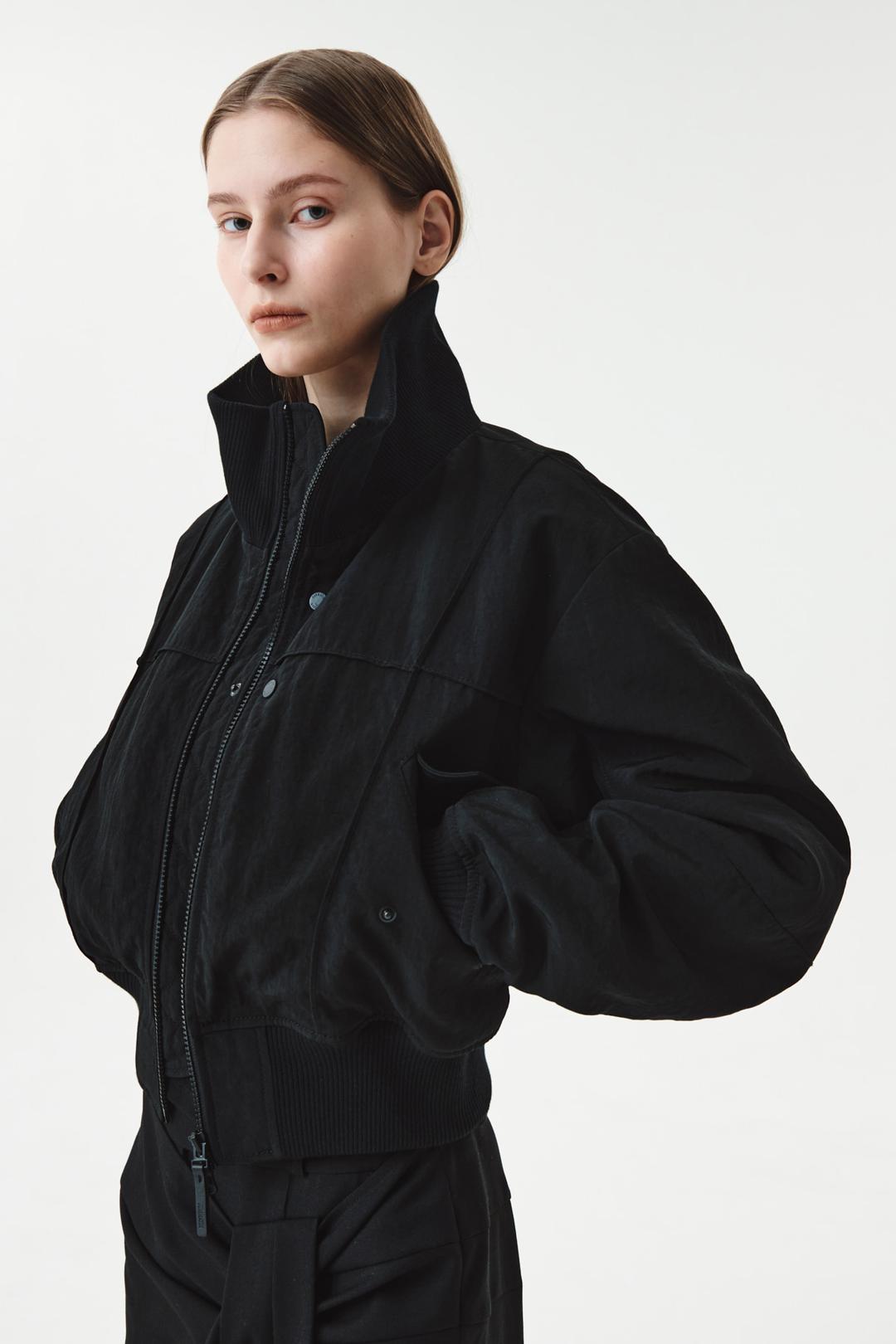 PINTUCK POINT HIGH NECK BOMBER JUMPER IN BLACK