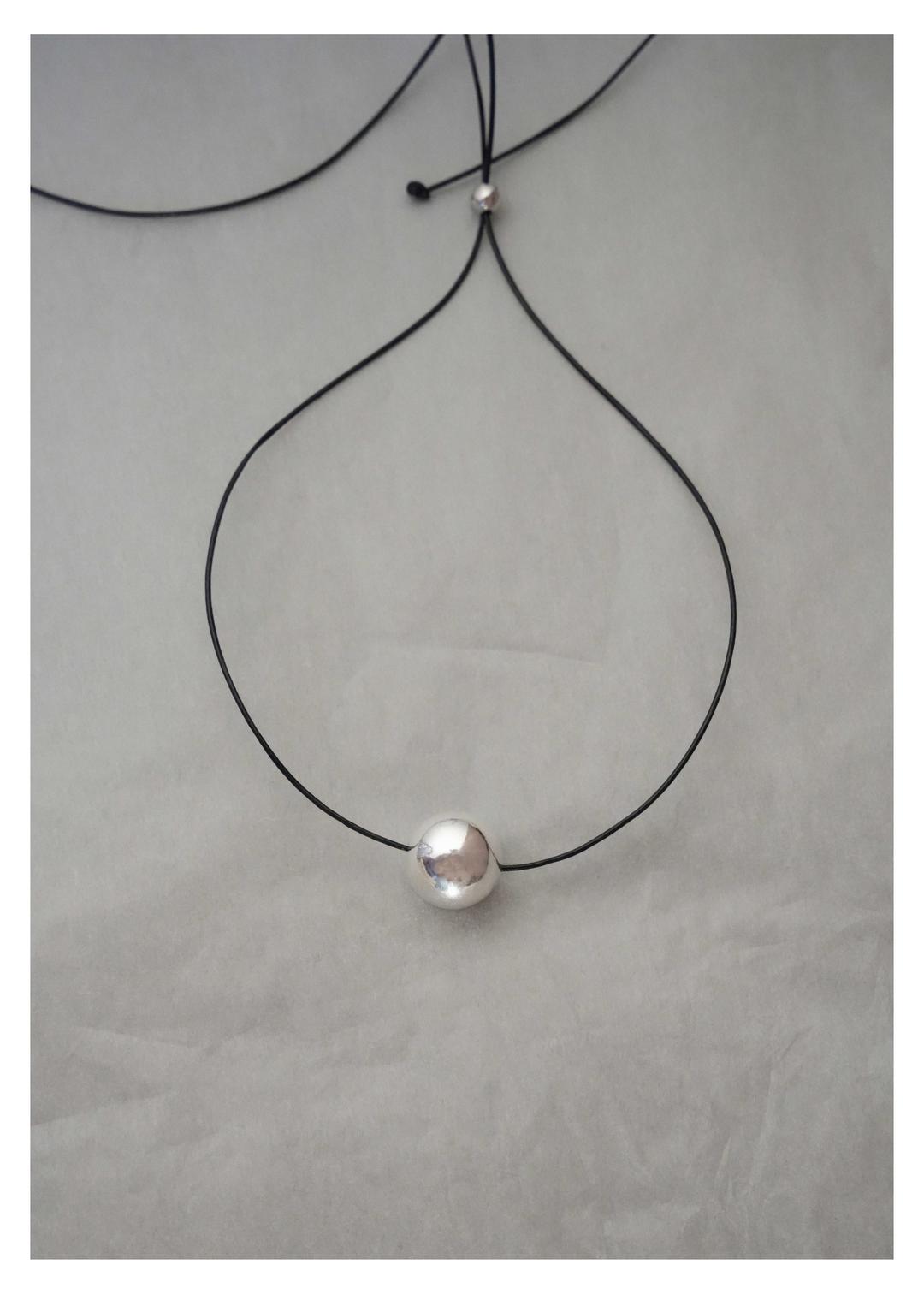 Big silver ball tie necklace