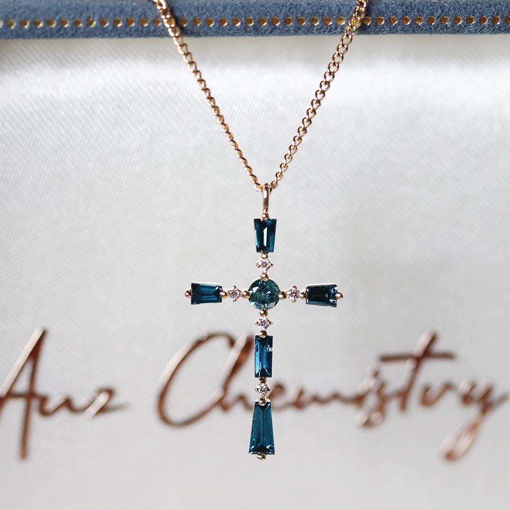 blue & white diamond cross necklace