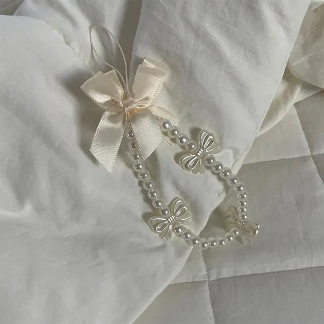 [당일출고] 리틀림 아이보리 리본 진주 스트랩 휴대폰줄