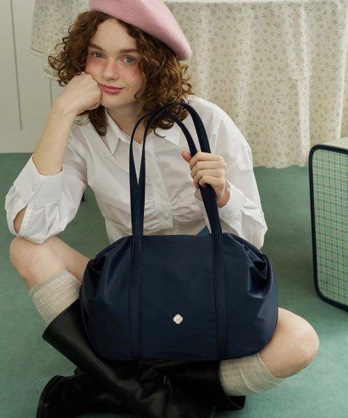 오로라 셔링 더플백_네이비