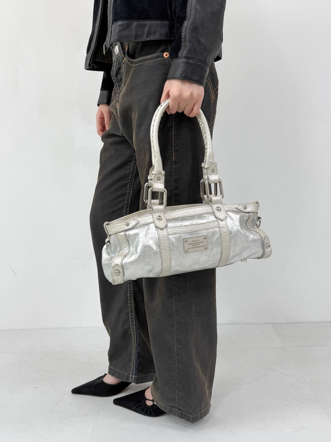 680. Silver barrel bag
