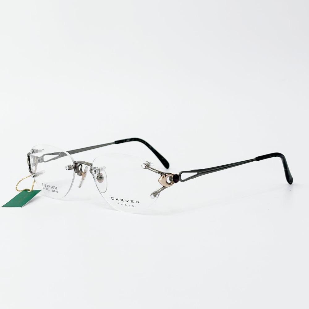 CARVEN gray stone rimless glasses