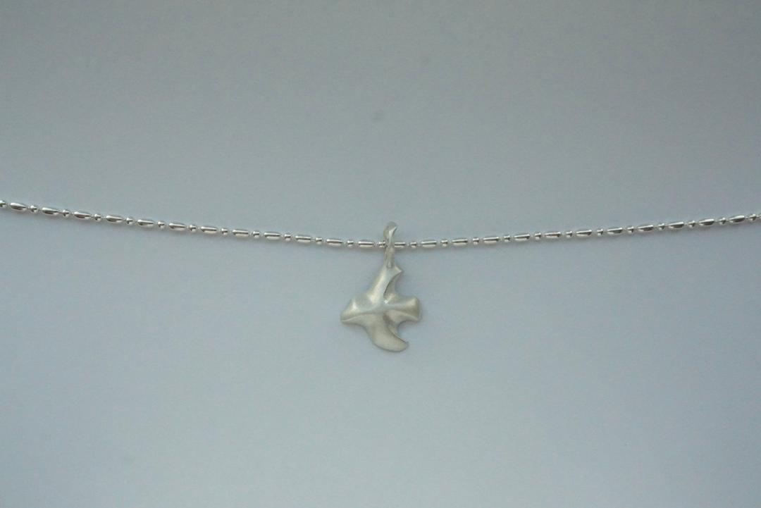 b cross pigeon necklace