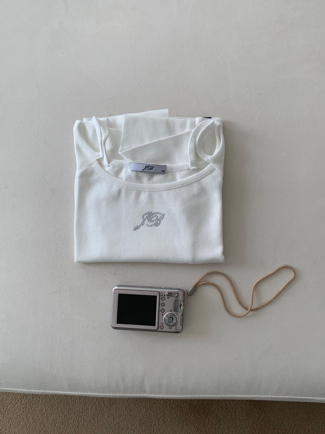 Jewelry open shoulder. Ivory