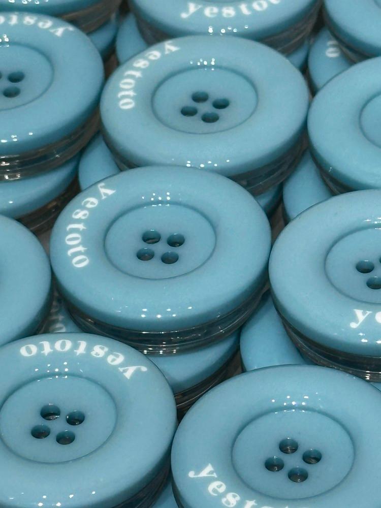 calm blue buttontok
