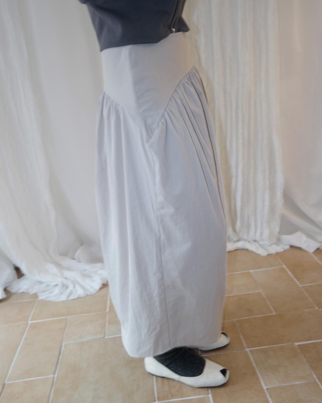 이알알 curved hem skirt_beige