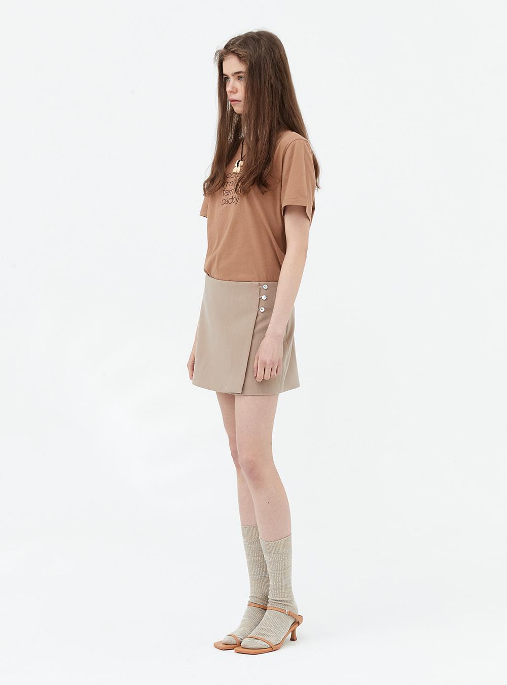 Low rise wrap mini skirt. Beige