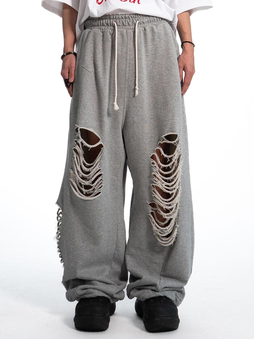 tears destroyed sweat pants (3c)