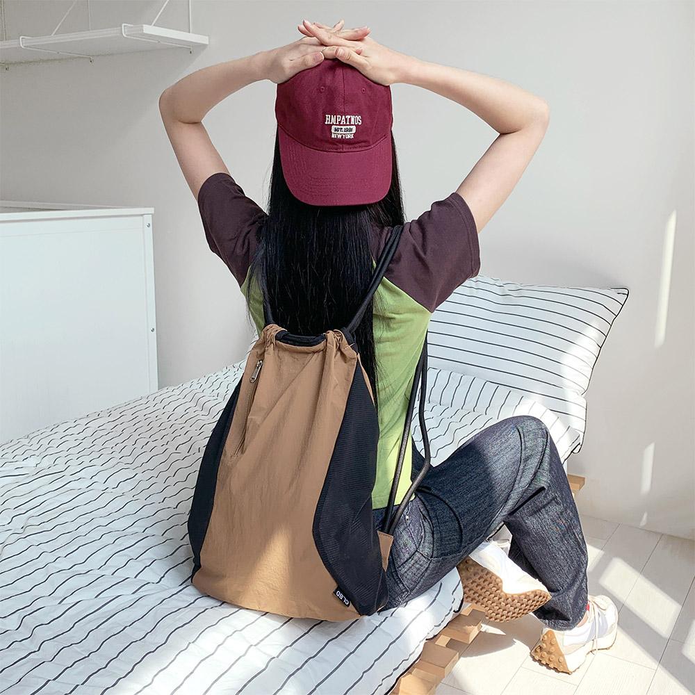 비마이뮤즈 [여름추천/생활방수💦] 니콜 배색 스포티 스트링 백팩 짐색 대학생 새학기 개강룩 바스락 운동 여행 주황 카멜 가방