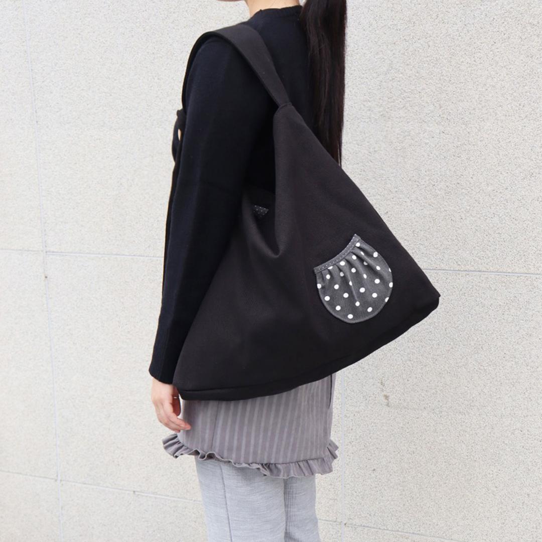 black dot pocket hobo bag