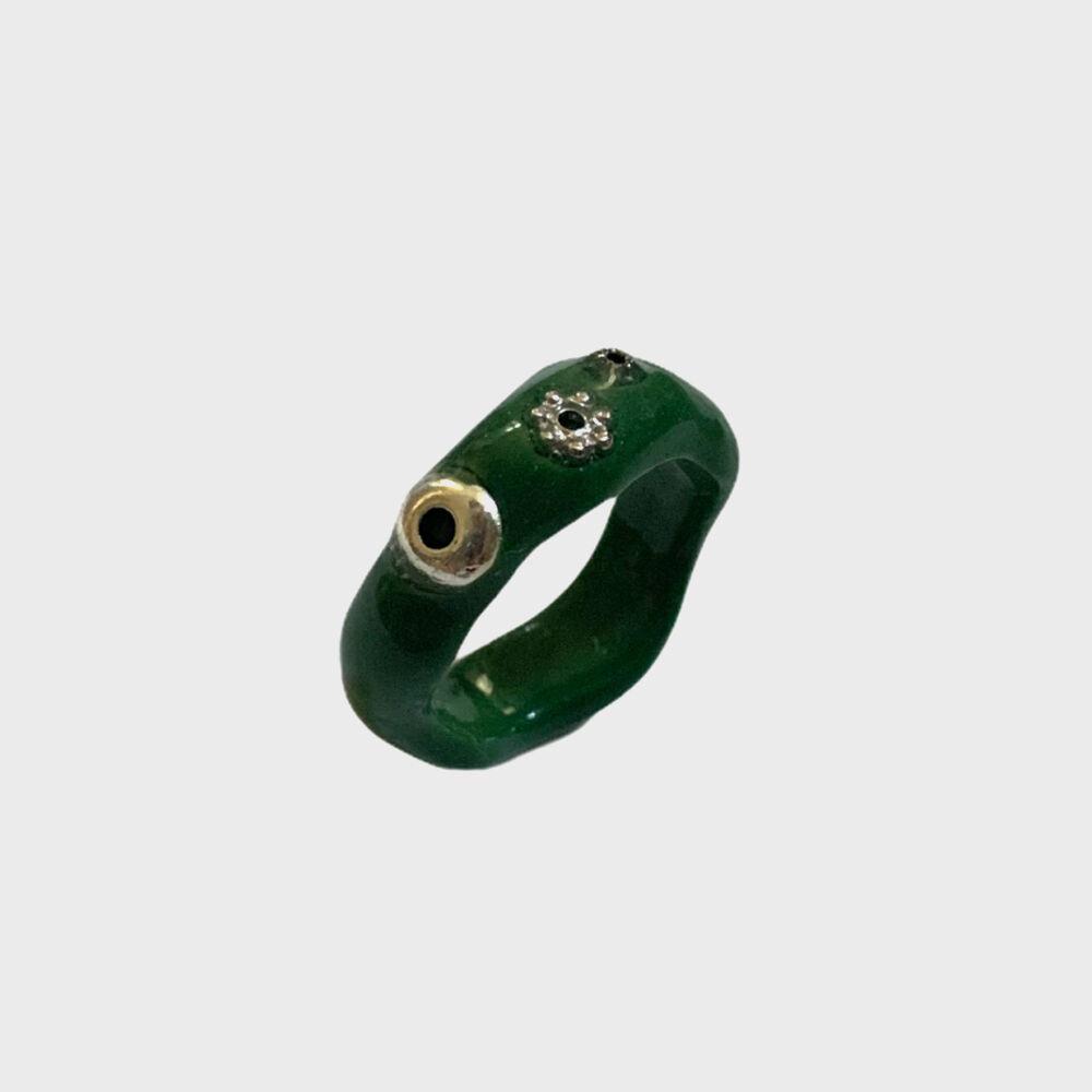 atypic khaki color metal motif