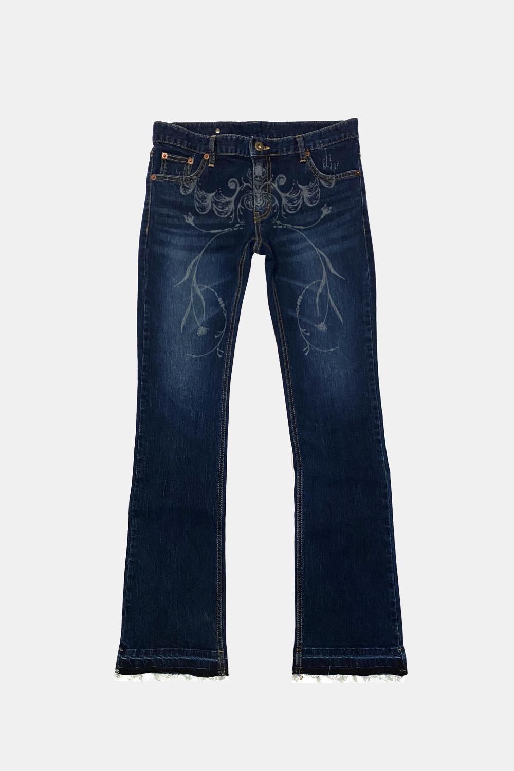 tattooed hiphugger denim