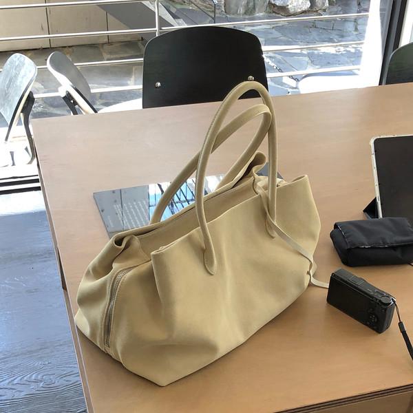 Pocket suede bag