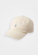 Casquette - guide cream