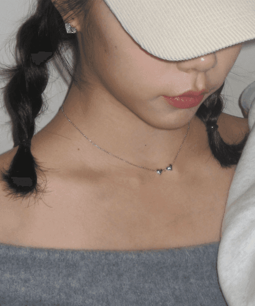 Two heart symbol necklace