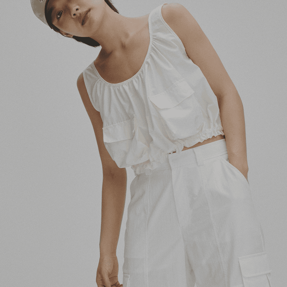 Sleeveless two pocket vest (cream)