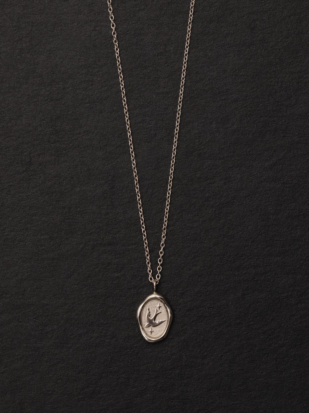 oval wax seal necklace: swallow.